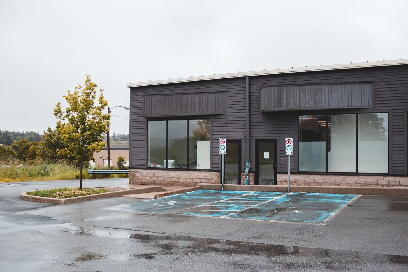 Workplace building and parking area in front